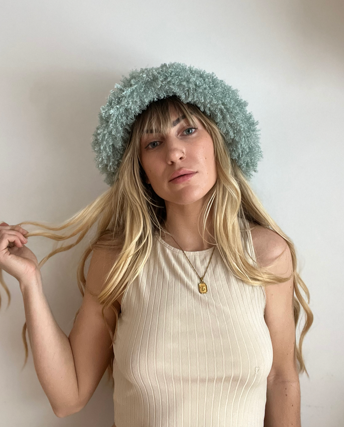 Fuzzy teal bucket hat