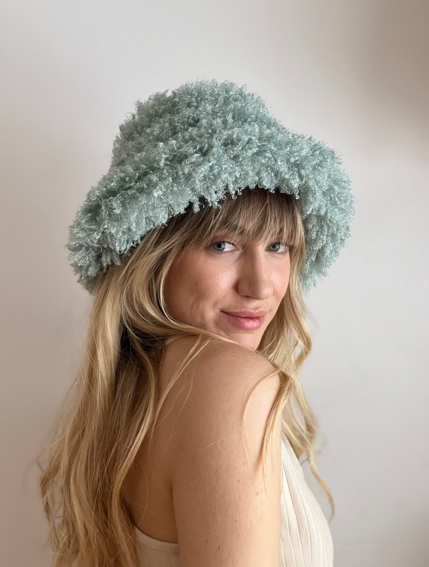 Fuzzy teal bucket hat